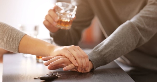 drunk man reaching for car keys